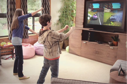 Picture of children playing a video game