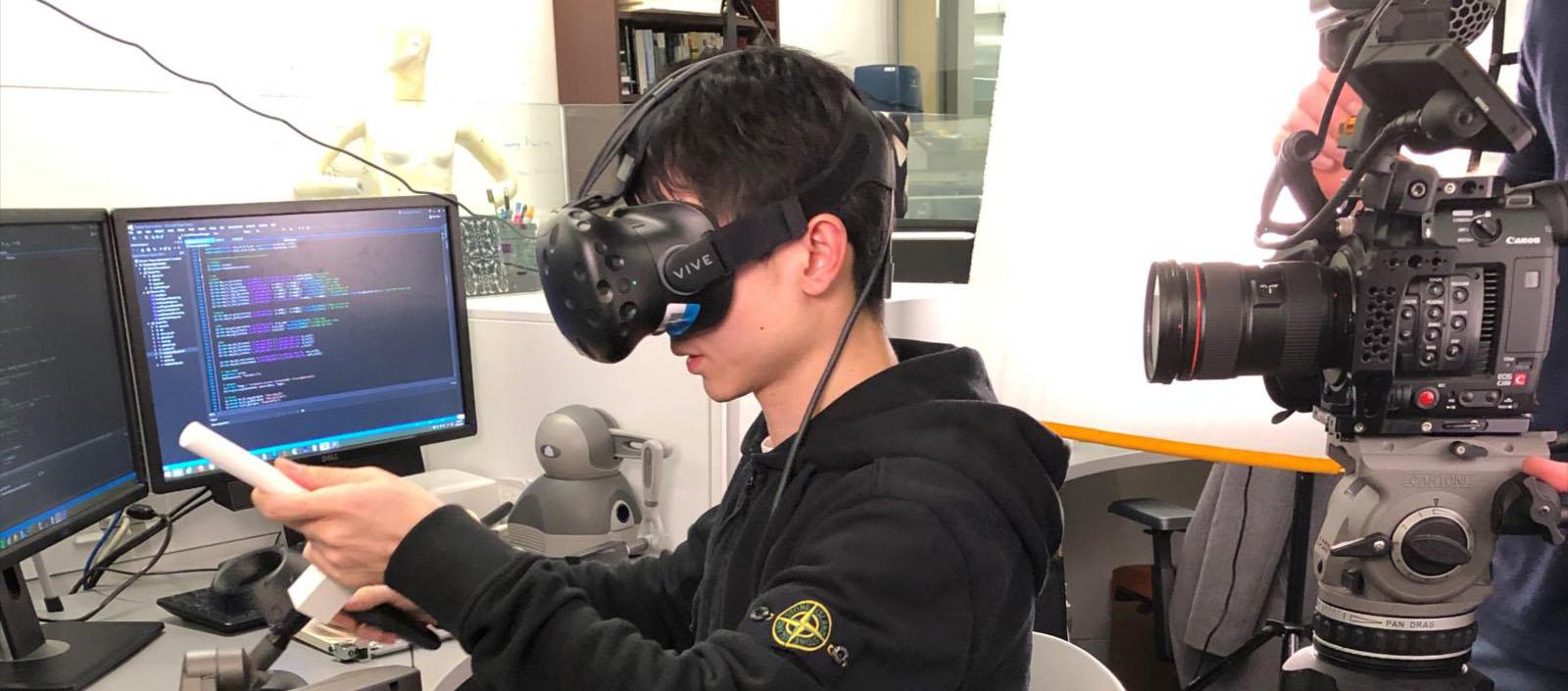 A student uses a VR headset